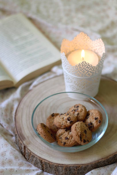 istock Cookies, Candle and Book 1273213823