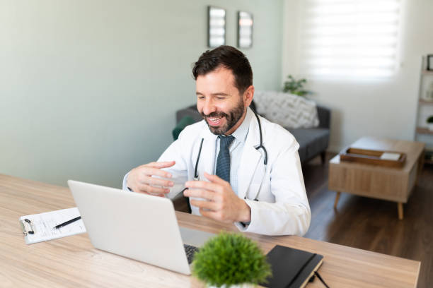 istock Video call with a Hispanic doctor working from home 1273214492