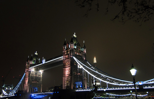 The Tower Bridge side view at night