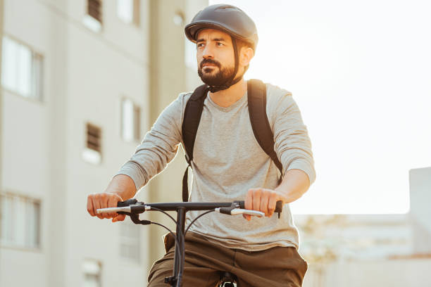 istock Male cyclist riding in the city. 1273216530