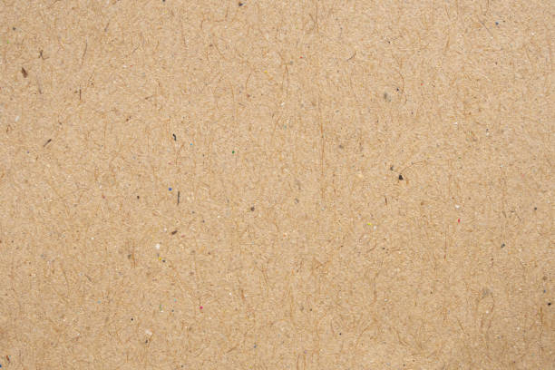 istock Brown eco recycled kraft paper sheet texture cardboard background 1273222934