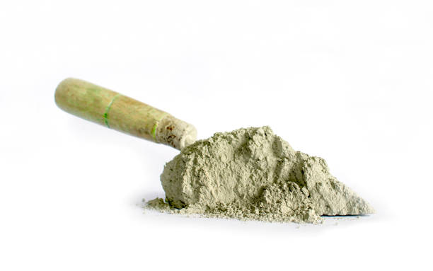 istock Cement or mortar, including trowel, used for separate construction work on a white background. 1273226265
