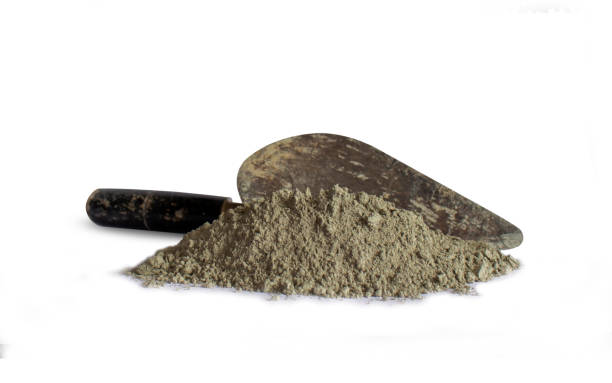 istock Cement or mortar, including trowel, used for separate construction work on a white background. 1273226284