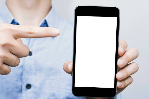 istock Mobile phone white screen mockup template, blue shirt, Asian businessman. copy space 1273227057