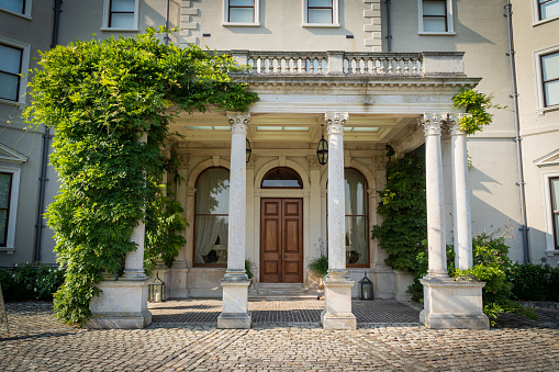 Entrance and front door to Farmleigh house, a historic house, estate and working farm is the official Irish state guest house, in Phoenix Park, Dublin, Ireland
