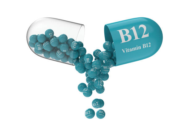 istock Open capsule with b12 from which the vitamin composition is pouring 1273227234