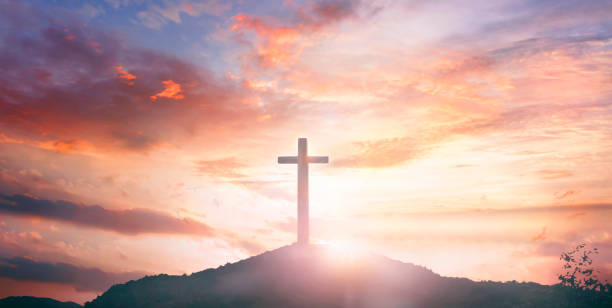 istock Religious concept: Silhouette cross and birds flying on  sunrise background 1273228033