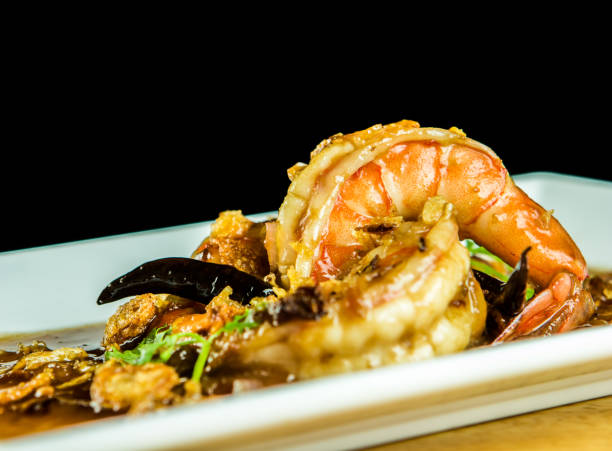 istock Fried  prawns with tamarind sauce in plate 1273234001