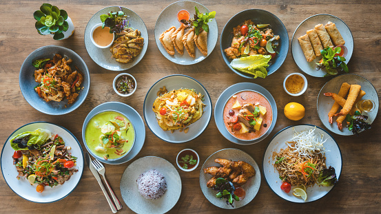 Table top view of Thai food displayed on table.