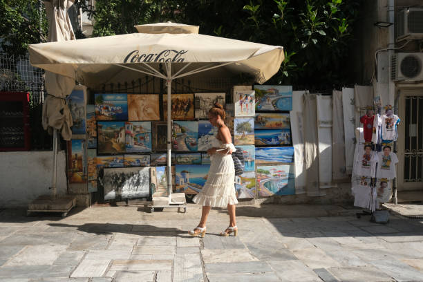 Tourists walk in Plaka district in central Athens, Greece on  August 25, 2020