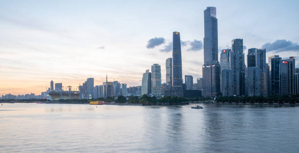 istock Guangzhou skyline at sunset 1273249598