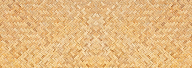 tradizionale texture in bambù intrecciato artigianale per striscione, intrecciare sfondo motivo legno. - wicker textured bamboo brown foto e immagini stock