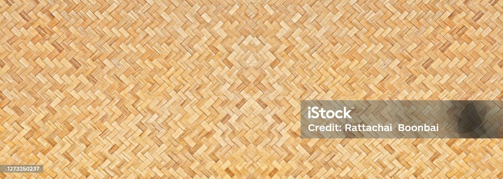 Traditional handcraft woven bamboo texture for banner, weave wood pattern background. Rattan Stock Photo