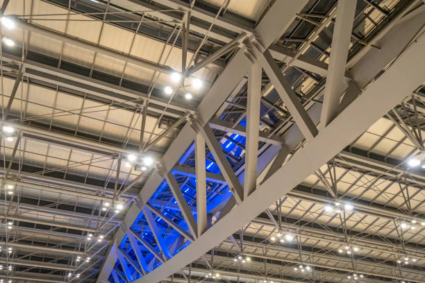 istock Large steel frame in the building with spotlights. 1273251521