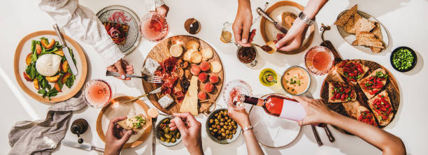 istock Wine and snacks party with rose wine, salads and appetizers 1273253758