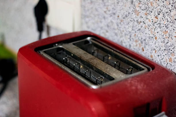istock Red kitchen toaster close up, macro photo 1273256785