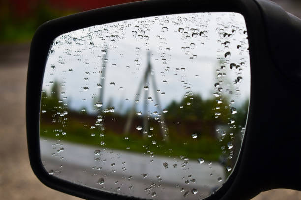 istock water droplets on the side mirror of a car 1273257147