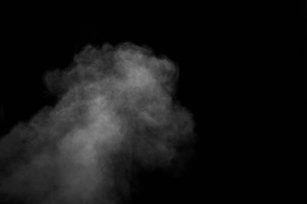 istock Smoke, steam, vape isolated on black background, looks like a cloud. Abstract background, design element 1273259752