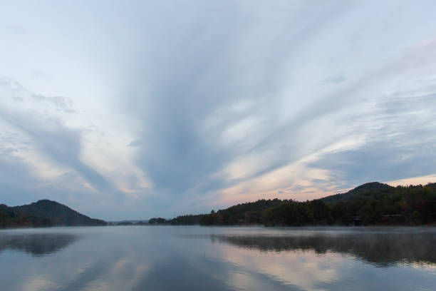 istock Dramatic sky reflected in the lake in the morning 1273269785