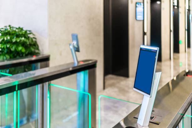 istock turnstile gate in office building with digital facial scaner. 1273270580