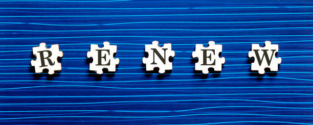 istock Puzzle piece with RENEW text on a blue background. 1273270701