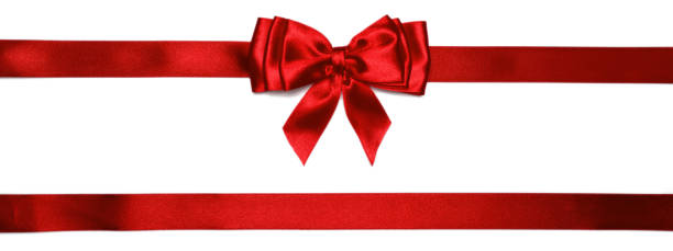 istock Red shiny bow with ribbons with long ribbon extending on both sides. 1273270791