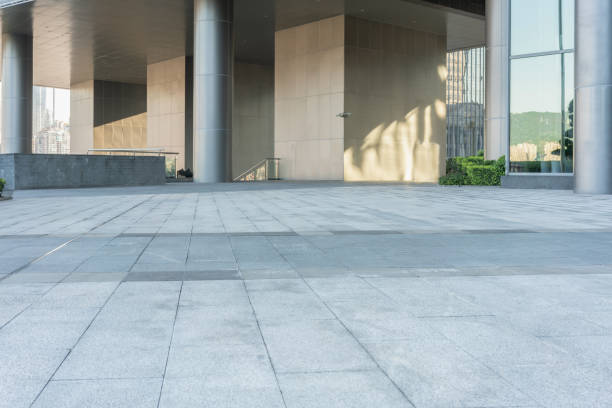 istock empty ground floor and modern office buildings  in downtown. 1273274208