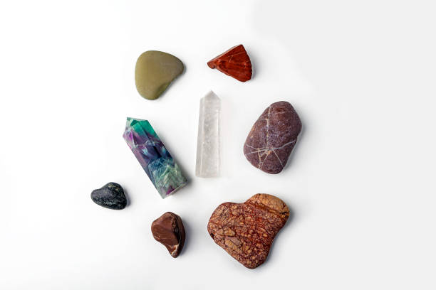 istock Gemstones fluorite, quartz crystal and various stone. Flat lay layout from magic rock for mystic ritual, witchcraft and spiritual practice. Natural stones for spa therapy 1273274438