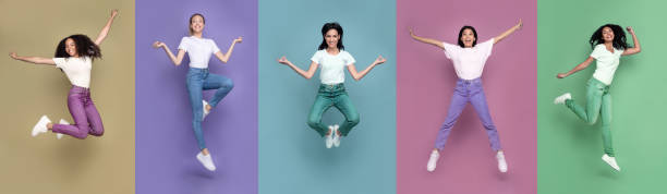 istock Multicultural Women Jumping Posing In Different Poses Over Colorful Backgrounds 1273276419