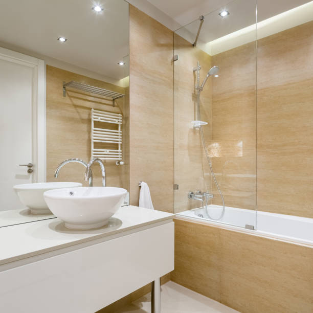 istock Elegant, beige bathroom with stylish washbasin 1273276578