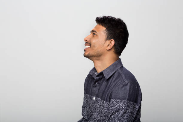 istock Side view of smiling young man 1273277343