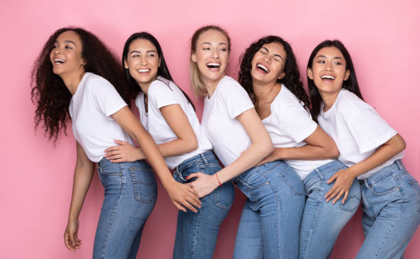 istock Five Diverse Women Having Fun Laughing Posing Over Pink Background 1273278775