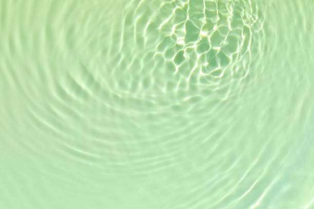 istock green transparent clear water surface texture summer background 1273281735