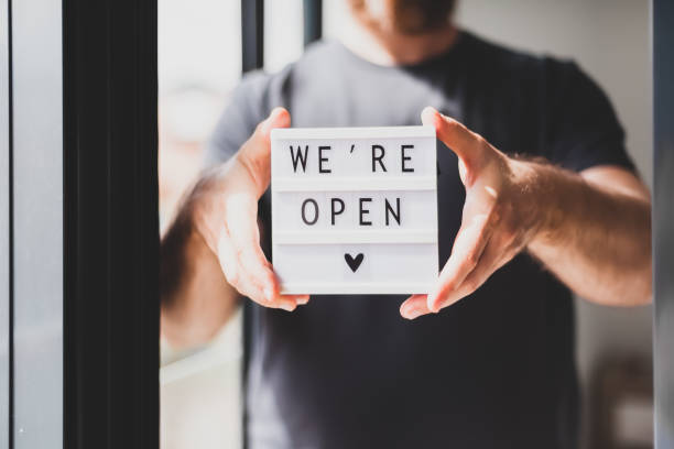 istock End of quarantine. Greeting message We're open 1273283961