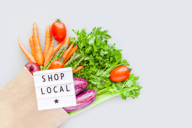 istock Fresh organic vegetables in craft shopping bag 1273284827