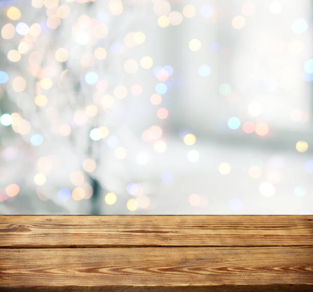 istock abstract background with bokeh light and wooden background 1273284944