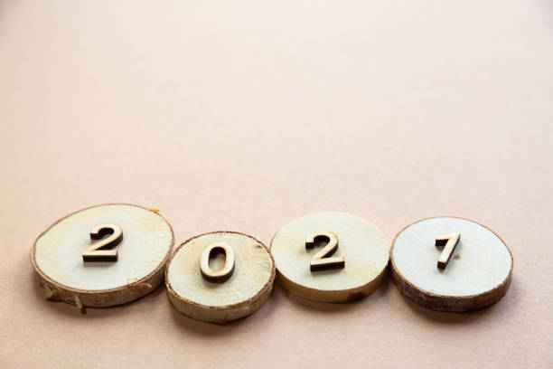 istock 2021 wood festive composition on a beige background with copy space. 1273284999