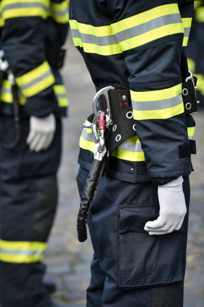 istock Fire fighters uniform detail with carabiner and harness during ceremony 1273285517