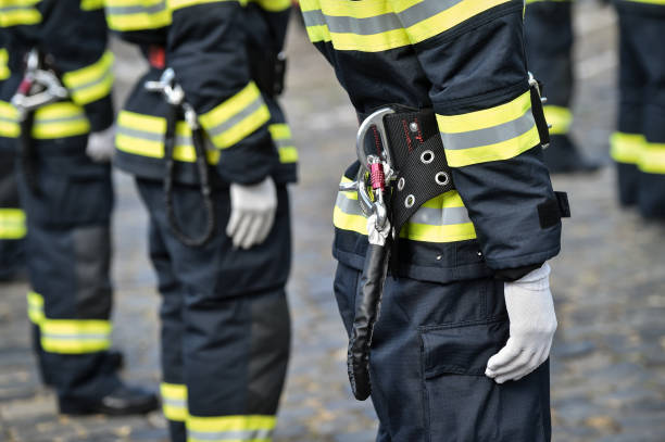 istock Fire fighters uniform detail with carabiner and harness during ceremony 1273285518