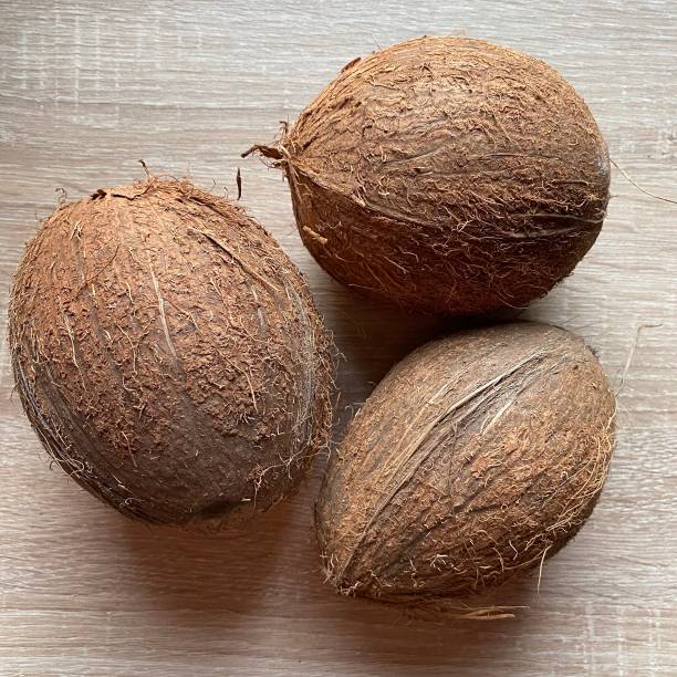 istock Image of a ripe coconut close-up on the table 1273286235