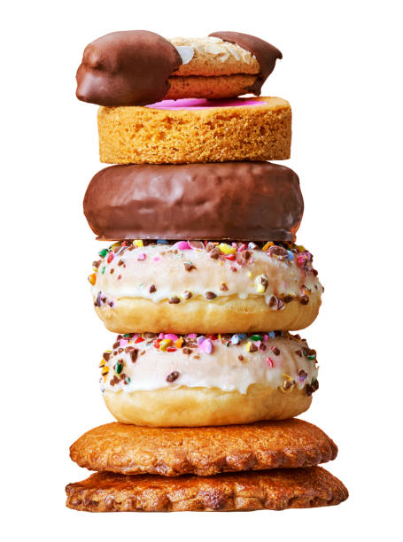 istock Donuts, cookies and pastries in a studio setting, isolated on white 1273286425