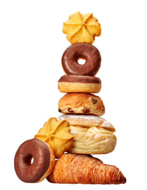 istock Cookies, donuts and pastries in a studio setting, isolated on white 1273286670