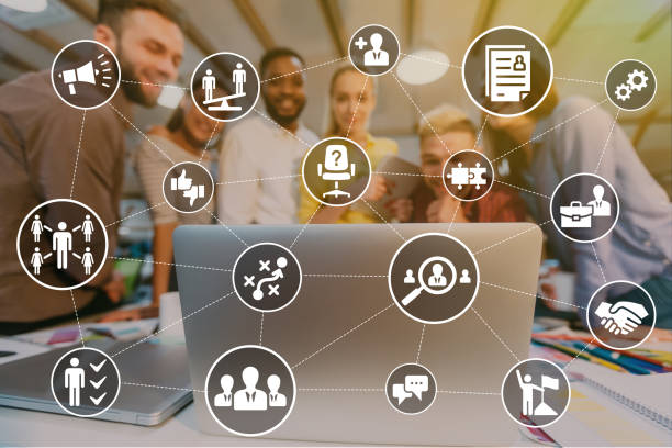 istock IT designers working on laptop indoor, collage with icons 1273286727