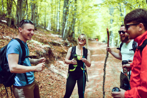 istock Hikers Relaxing With A Conversation To Relief Hiking Fatigue 1273287695