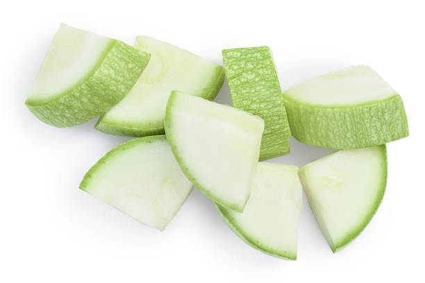 istock diced zucchini or marrow isolated on white background with clipping path and full depth of field. Top view. Flat lay 1273288173