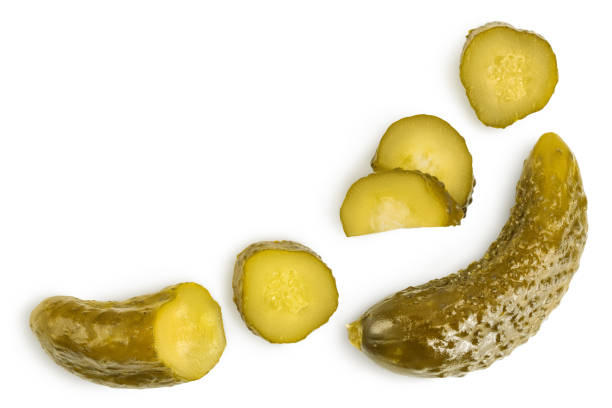 istock Marinated pickled cucumber isolated on white background with clipping path and full depth of field. Top view with copy space for your text . Flat lay 1273288190