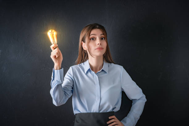 Young woman thinking a big idea stock photo