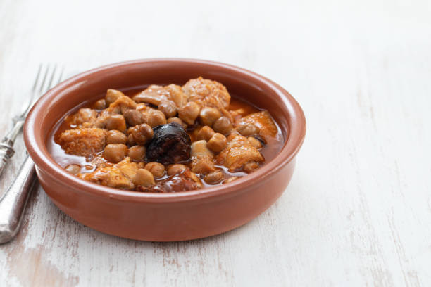 istock spanish dish callos, beef tripe stew with chickpeas, morcilla and chorizo in ceramic bowl 1273294147