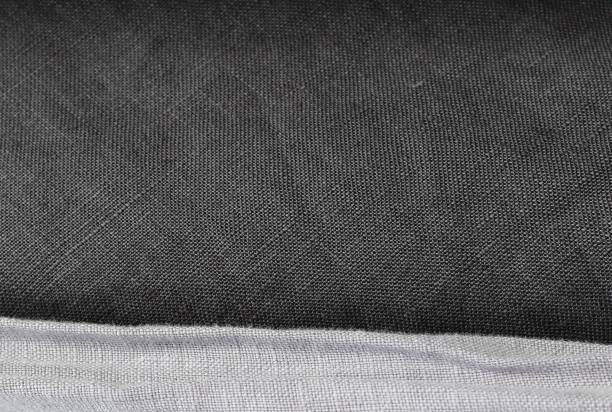 istock Detailed close up view on samples of cloth and fabrics in different colors found at a fabrics market 1273294254