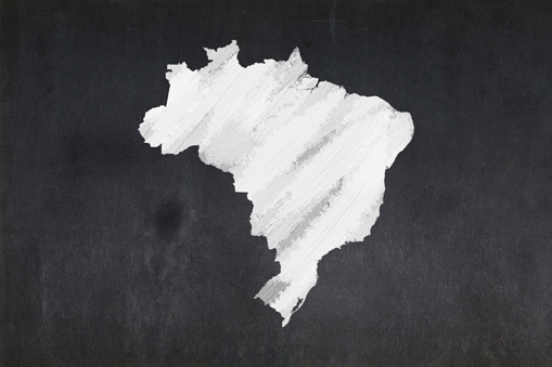 Blackboard with a the map of Brazil drawn in the middle.